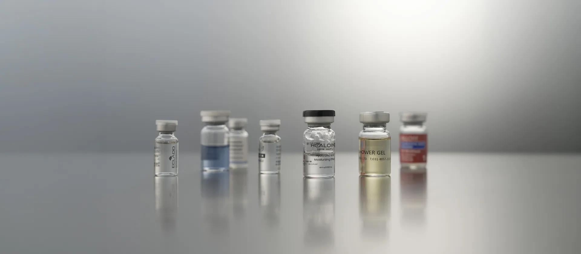 이수이엔지 VLAL-100 액상 충전 클로징 실링 (고속) - VLAL-100은 분당 100개의 처리 능력을 갖춘 2-STEP 시스템 기반 고속 액상 충전·클로징·실링 통합 장비입니다
